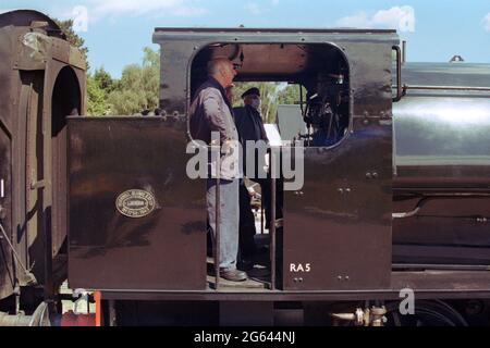 Leicester, UK - 29 May 2021: The crews on the footplate of a steam locomotive. Stock Photo
