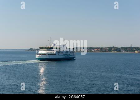 Helsingor, Denmark - 17 June 2021: the ForSea ferry making the crossing across the Oresund Strait from Denmark to Sweden Stock Photo