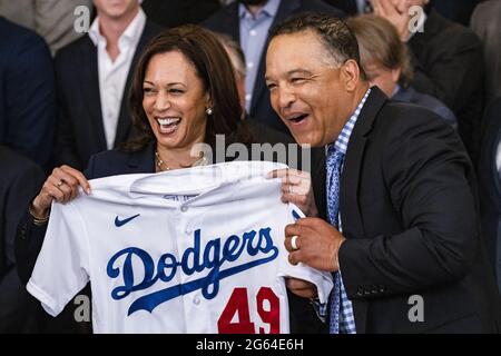 U.S. Vice President Kamala Harris holds up a jersey presented to her by Dave Roberts, team manager of the Los Angeles Dodgers, during a ceremony in the East Room of the White House in Washington, D.C., U.S., on Friday, July 2, 2021. Biden is hosting the Dodgers to celebrate their 2020 World Series victory, as the administration does more large, in-person events now that coronavirus vaccination rates have increased. Photo by Samuel Corum/Pool/ABACAPRESS.COM Stock Photo