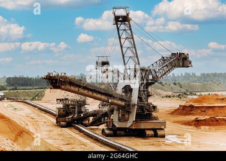 Giant bucket wheel excavator. The biggest excavator in the world. The largest land vehicle. Excavator in the mines. Stock Photo