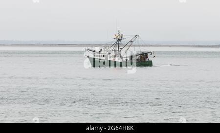 Westport, WA, USA - June 24, 2021; The fishing trawler George Allen in the entrance to Grays Harbor in the Pacific Northwest Stock Photo