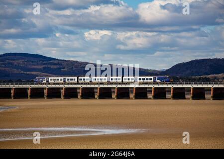 FILE IMAGE: Arnside Viaduct, Cumbria Unit Kingdom CAF Class 195 three car train. THe final Class 195 Civity train for Northern Trains was delivered in December 2020, completing an order, awarded in 2016, for 25 two-car and 33 three-car set trains. These trains join a fleet of 43 Class 331 units which have also entered into service giving a combined order for Northern of 101 trains.Credit: PN News/Alamy Live News  Stock Photo