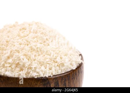 Raw Organic Unsweetened Coconut in a Wooden Bowl Stock Photo