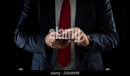 Close up of a man using mobile smart phone. Stock Photo