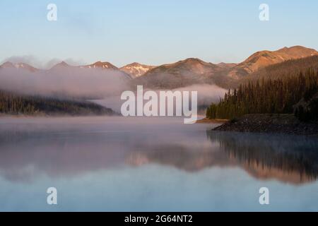 Early Summer morning looking south of Long Draw Reservoir.  The backdrop of the dramatic Never Summer Mountain Range, in Rocky Mountain National Park. Stock Photo
