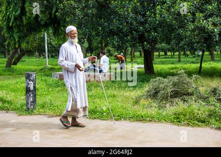 Old man begging on the street. I captured this image on August 11, 2018, from Dhaka, Bangladesh,  South Asia Stock Photo