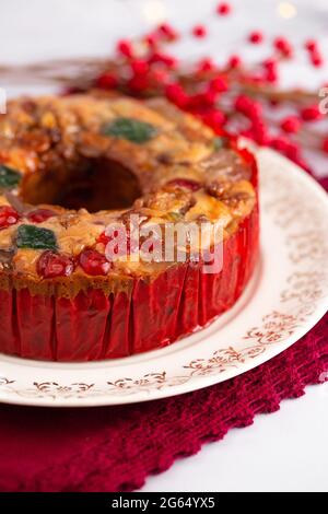 Round Fruit Cake with Cherries Pineapples and Nuts Elegant Platter Stock Photo