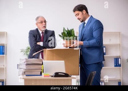 Two employees in dismissal concept Stock Photo