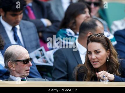 London, Britain. 2nd July, 2021. The Duchess of Cambridge (R, front row) is seen in the royal box during the women's singles third round match between Garbine Muguruza of Spain and Ons Jabeur of Tunisia at Wimbledon tennis Championship in London, Britain, on July 2, 2021. Credit: Han Yan/Xinhua/Alamy Live News Stock Photo