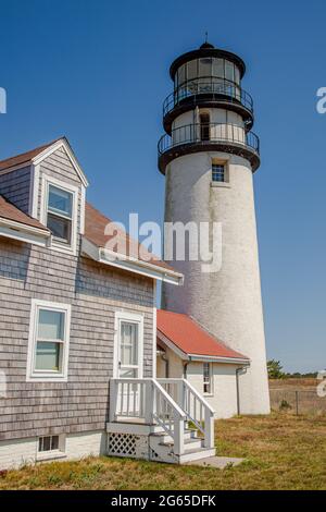 The Highland Light, also known as Cape Cod Light, is an active lighthouse on the Cape Cod National Seashore in North Truro, Massachusetts. Stock Photo