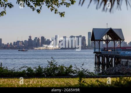 The view from Waterfront Park in North Vancouver, looking at the Vancouver Canada Place Sails across the Burrard Inlet Stock Photo