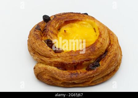 A raisins cream brioche isolated on white background. Stock Photo