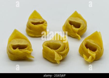 Traditional Italian Raw Tortellini isolated on White Background Stock Photo