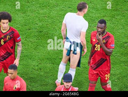 Alessandro Bastoni, ITA 23 without jersey and trousers, Axel WITSEL, Belgium Nr.6 Christian Benteke, Belgium Nr.20  in the quarterfinal match BELGIUM - ITALY  at the football UEFA European Championships 2020 in Season 2020/2021 on July 02, 2021  in Munich, Germany. © Peter Schatz / Alamy Live News Stock Photo