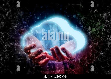 persons hand hold glowing cloud, data information digital storage concept Stock Photo