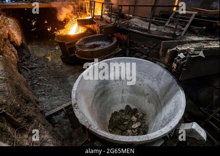 Special metallurgical ladles. The process of pouring molten metal Stock Photo