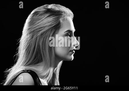 sad woman profile silhouette on black background with copy space, closed  eyes, monochrome Stock Photo - Alamy