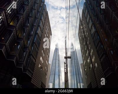 London, Greater London, England - June 26 2021: The Shard skyscraper reflected in the buildings in More London Riverside. Stock Photo