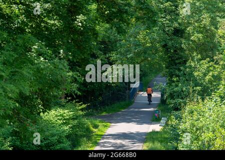 The Grugatrasse, former railway line, now cycle path, footpath, from Mülheim via Essen-Rüttenscheid, to Essen-Steele, Essen, NRW, Germany, Stock Photo