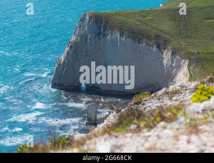 Walking from Durdle Door west along the beach passed Butter Rock and on to Bats Head, Dorset coastline. Stock Photo