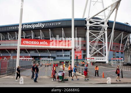 Cardiff, Wales, UK. 3rd July, 2021. Rugby fans in Cardiff city centre as a limited number of fans return to the Principality Stadium for the first time since February 2020. No food or drink will be served inside the ground during the match between Wales and Canada and alcohol is banned. Credit: Mark Hawkins/Alamy Live News Stock Photo