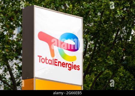 Logo on the sign of a TotalEnergies gas station, new name of the French oil company Total Stock Photo