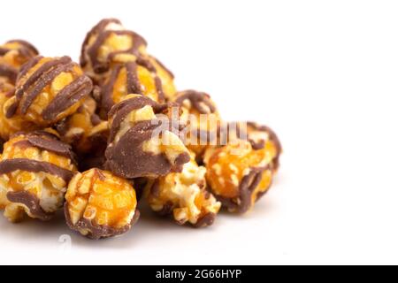 Chocolate Stripped Caramel Popcorn on a White Background Stock Photo