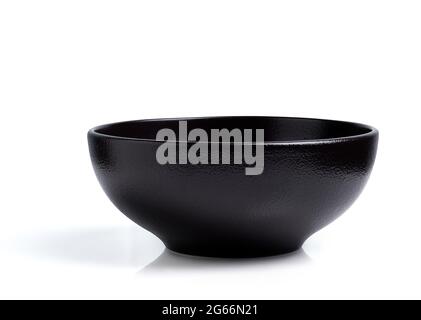 Empty black ceramic bowl isolated on white background Stock Photo