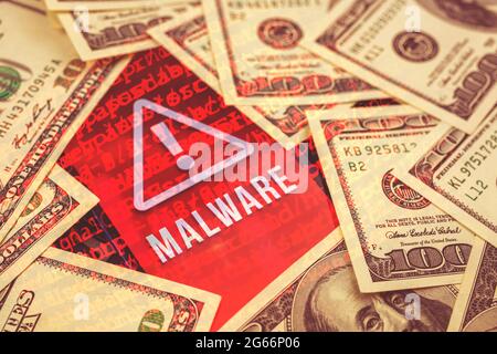 Cyber attacks concept, cyber crime background with virus malware on the screen of smartphone, banknote on the mobile phone Stock Photo