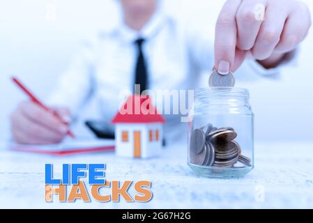 Hand writing sign Life Hacks. Word Written on strategy or technique adopted to manage activities efficiently New home installments and investments Stock Photo