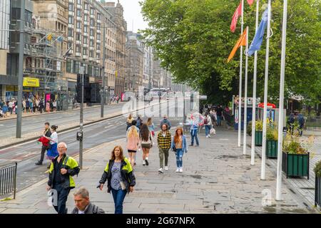 The Mound, Edinburgh, Scotland, UK, 3rd of July 2021:  A Julian Assange supporter, is seen on Princess Street, handing out leaflets to members of the public.  Julian Assange supporters took to the streets of Edinburgh to mark Julian’s 50th birthday, this is one of many celebrations taking place around the world today. Julian Assange is still being held in Belmarsh prison, as the US government are trying to extradite him to America, for the publications of leaked information on his wikileaks website. (Credit: Barry Nixon/Alamy Live News) Stock Photo