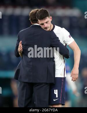 England manager Gareth Southgate embraces Declan Rice after the UEFA Euro 2020 Quarter Final match at the Stadio Olimpico, Rome. Picture date: Saturday July 3, 2021. Stock Photo