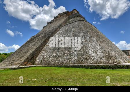 The Pyramid of the Magician at Uxmal, Yucatan, Mexico. It is the tallest and most recognizable structure in Uxmal. Stock Photo