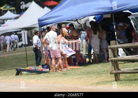 2021 Iroquois Steeplechase in Nashville, Tennessee, USA. The spectators are dressed for the society event of the year. Stock Photo