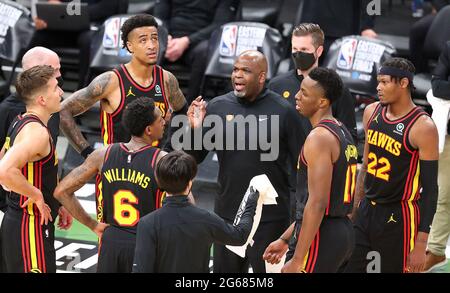 Milwaukee, USA. 02nd July, 2021. Atlanta Hawks interim head coach Nate McMillan with, from left, Bogdan Bogdanovic, John Collins, Lou Williams, Onyeka Okongwu, and Cam Reddish, looks for answers during a time out against the Milwaukee Bucks during the third quarter in Game 5 of the Eastern Conference Finals on Thursday, July 1, 2021, at Fiserv Forum in Milwaukee. The Bucks won, 123-112, for a 3-2 series lead. (Photo by Curtis Compton/Atlanta Journal-Constitution/TNS/Sipa USA) Credit: Sipa USA/Alamy Live News Stock Photo