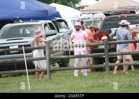 2021 Iroquois Steeplechase in Nashville, Tennessee, USA. The spectators are dressed for the society event of the year. Stock Photo