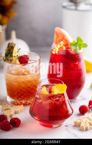 Variety of raspberry cocktails, bright and refreshing drinks Stock Photo