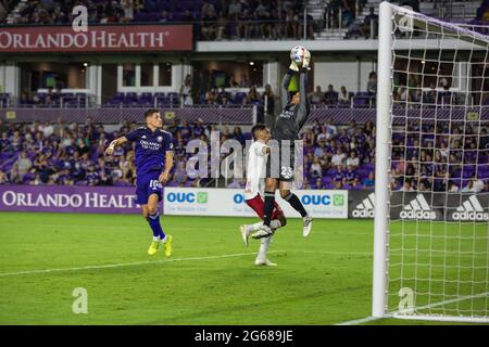 Exploria Stadium Orlando, FL, USA. 8th July, 2021. Orlando City SC goalkeeper Brandon Austin (23) jumps to grab the ball out of midair during MLS action between the NY Red Bulls and the Orlando City SC at Exploria Stadium Orlando, FL. New York defeats Orlando 2 - 1. Jonathan Huff/CSM/Alamy Live News Stock Photo