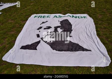 London, UK. 03rd July, 2021. A Free Assange banner seen during the demonstration in London.Protesters gathered at Parliament Square demanding the release of WikiLeaks founder Julian Assange, on his 50th birthday. Credit: SOPA Images Limited/Alamy Live News Stock Photo