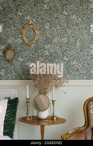 Artificial Flowers in Gold Vase at Room Corner Stock Photo - Alamy