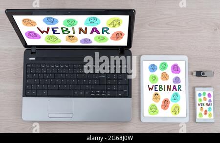 Webinar concept shown on different information technology devices Stock Photo