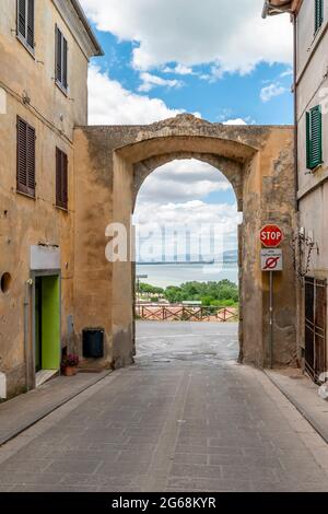 Lake Trasimeno seen from the Porta Fiorentina in Castiglione del lago, Umbria, Italy Stock Photo