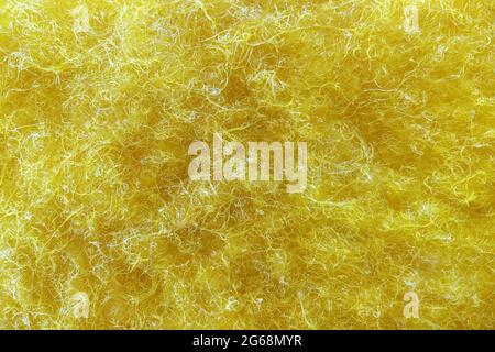 Yellow cleaning rag surface pattern high magnification Stock Photo
