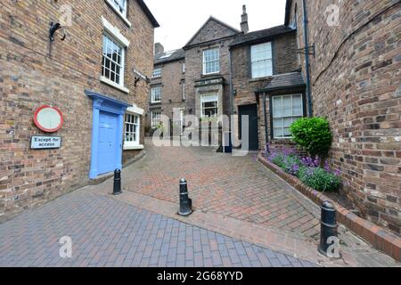 A narrow Victorian alleyway at Ironbridge in Shropshire. Stock Photo