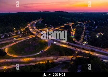 Highway interchange at night with car headlights at twilight, Conshohocken Pennsylvania USA