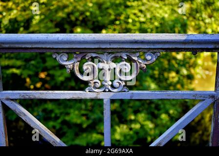 Detail of an iron bridge railing with ornamental decoration in Düsseldorf, Germany. Stock Photo