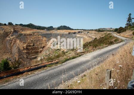 Huge mining hole at Waihi gold mine in New Zealand Stock Photo