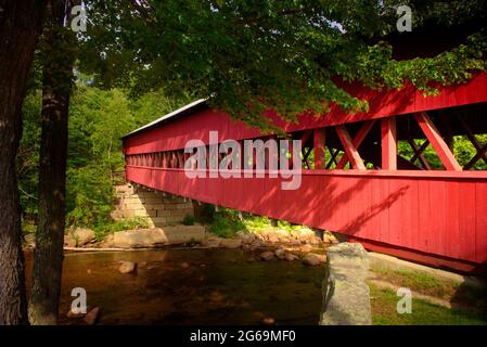 Swift river covered bridge in the white mountains Stock Photo