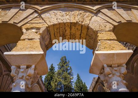 Detail of an arch of the Upper Basilical Hall in the administrative area of the 10th century fortified palace and city of Medina Azahara, also known a Stock Photo