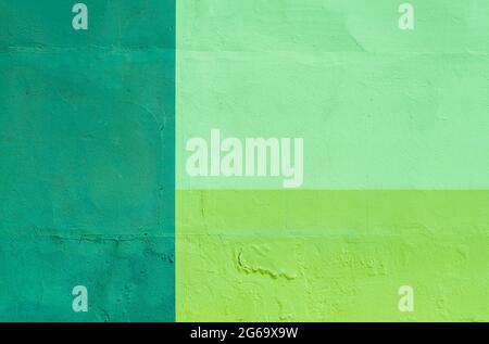 Green painted plaster wall, geometric abstract background Stock Photo
